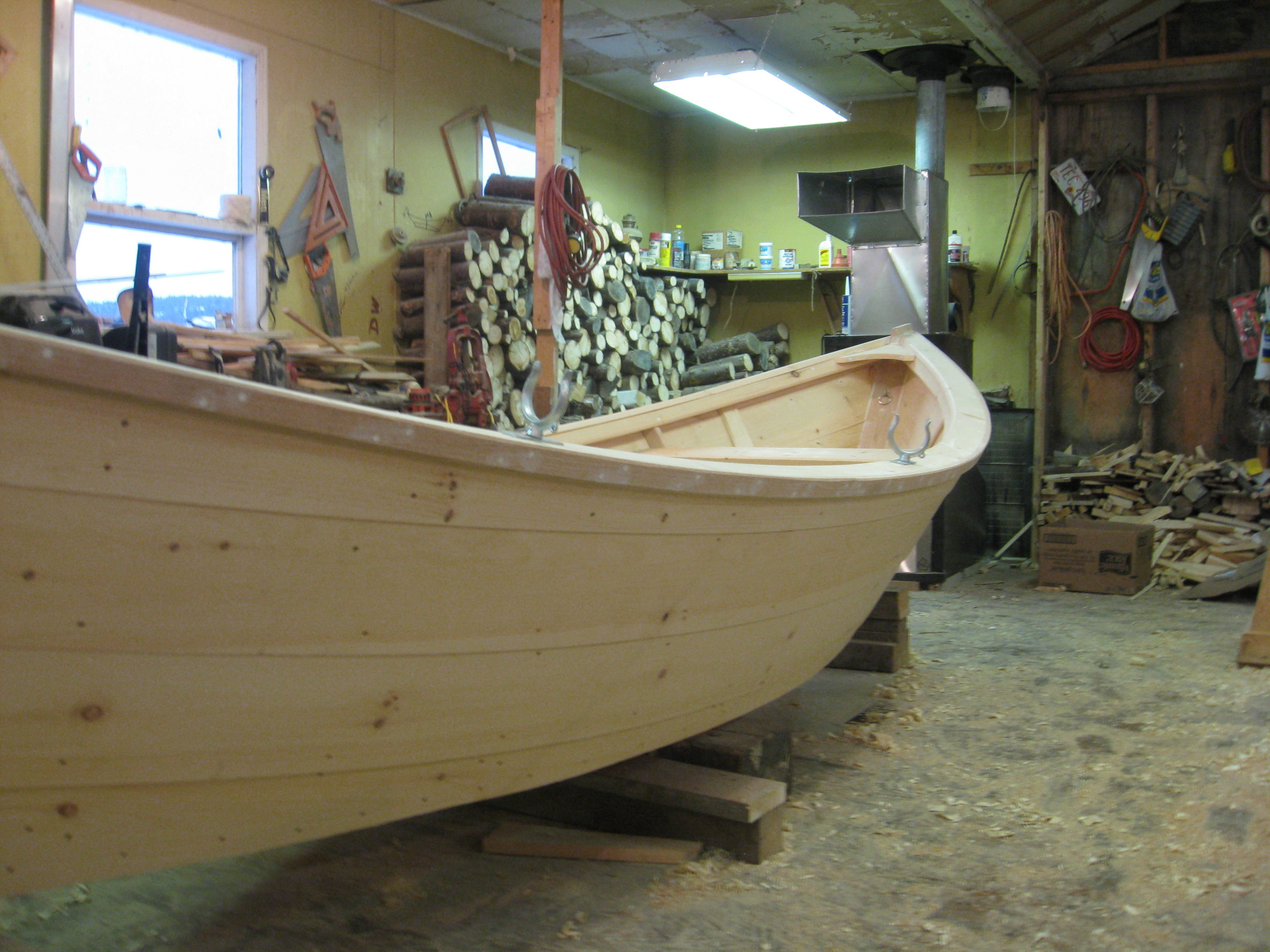Grand Banks dory hull complete in bare wood showing the timber construction